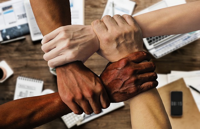 An image of hands holding together showing diversity