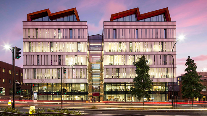 A long-exposure image of Charles Street building at twilight.