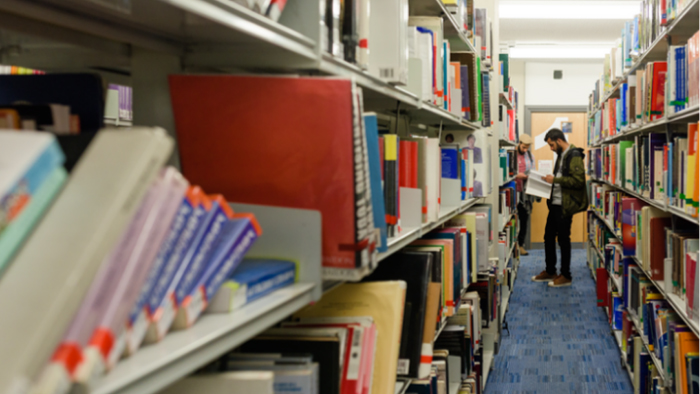 A student browsing a library